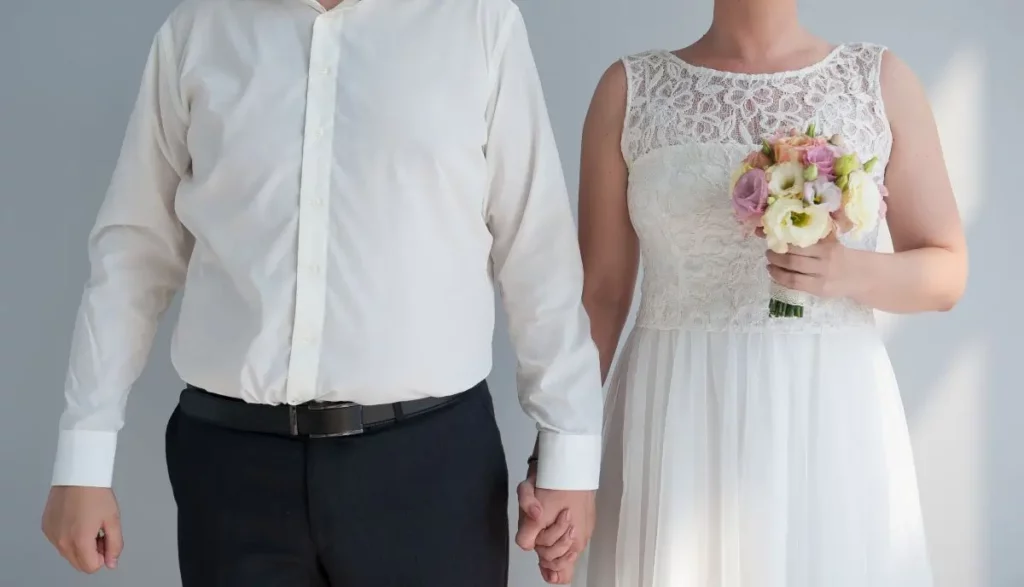 Bride and groom holding hands, symbolizing estate planning and the use of A-B trusts in second marriages to prevent future disputes.