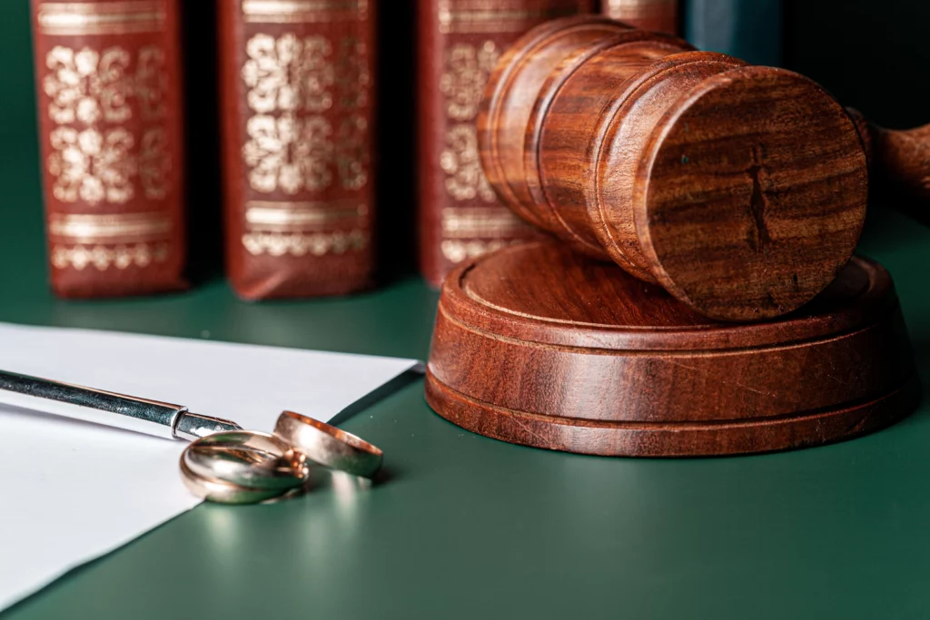 Gavel, wedding rings, and legal documents symbolizing second marriage probate.