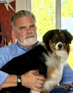 M. Jude Egan, J.D., Ph.D., Certified Family Law Specialist, with his dog Rowan